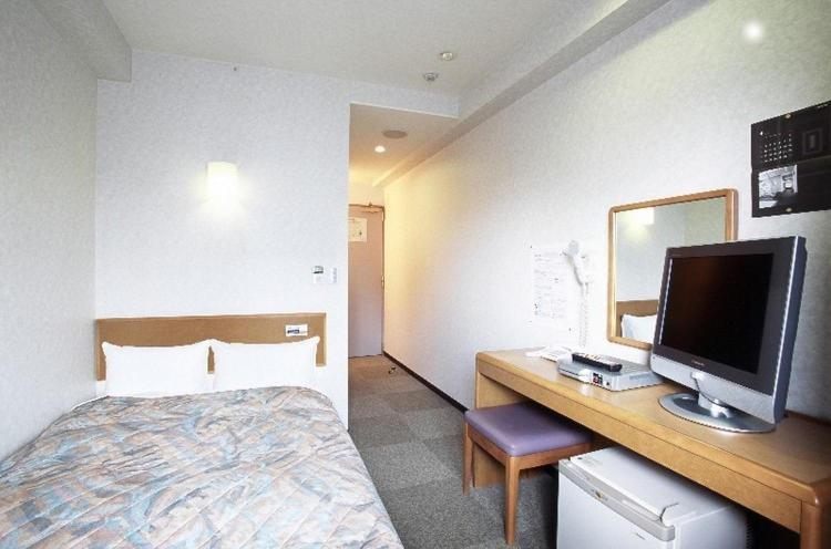 Hotel New Budget Muroran Cameră foto