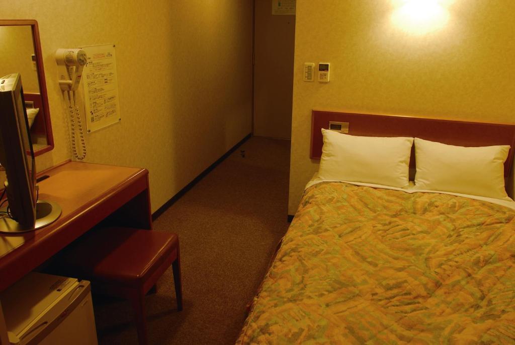 Hotel New Budget Muroran Cameră foto