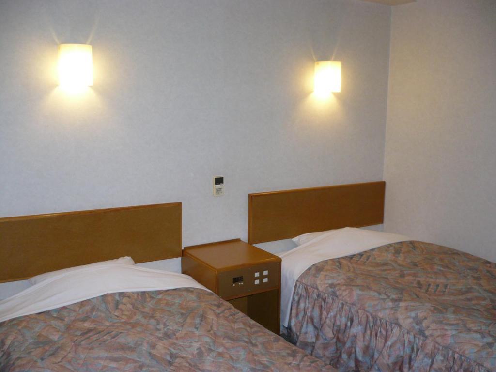 Hotel New Budget Muroran Cameră foto