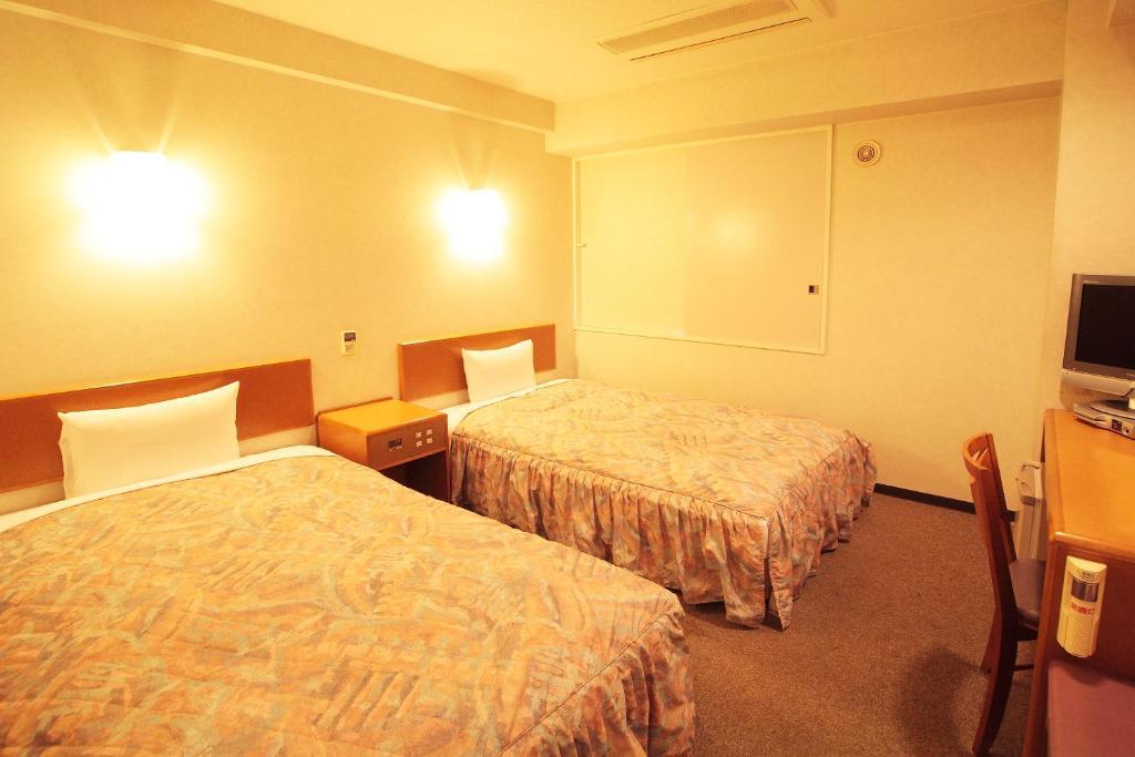 Hotel New Budget Muroran Cameră foto